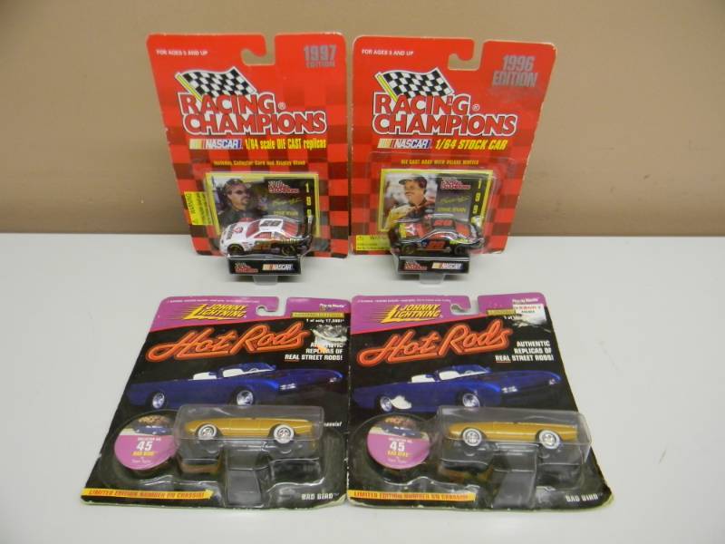 lot 36 image: LOT OF 2 ERNIE IRVAN RACING CHAMPIONS & LOT OF 2 JOHNNY LIGHTNING BAD BIRDS - NEW - SEE PICTURES