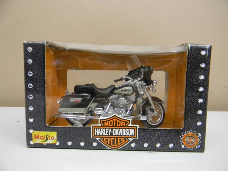 lot 9 image: MAISTO 118 SCALE DIE CAST METAL ELECTRA GUIDE MODEL - STILL IN BOX - SEE PICTURES