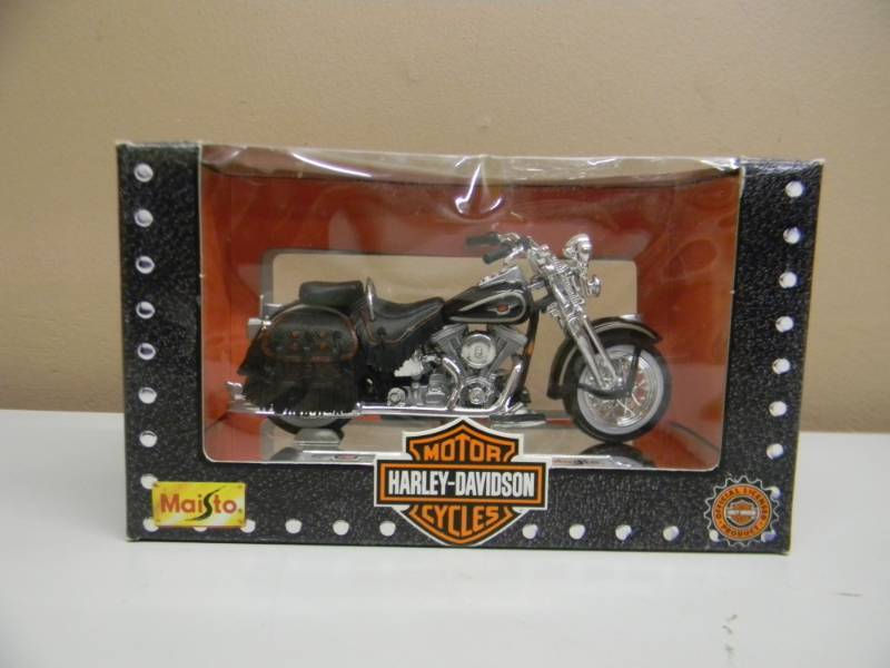 lot 11 image: MAISTO 118 SCALE DIE CAST METAL HERITAGE SPRINGER MODEL - STILL IN BOX - SEE PICTURES