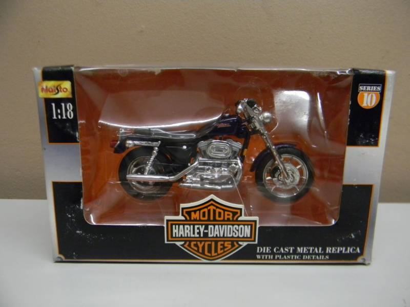 lot 26 image: MAISTO 118 SCALE DIE CAST METAL SERIES 10 2000 MODEL - STILL IN BOX - SEE PICTURES