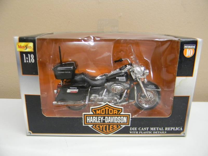 lot 28 image: MAISTO 118 SCALE DIE CAST METAL SERIES 10 2000 MODEL - STILL IN BOX - SEE PICTURES