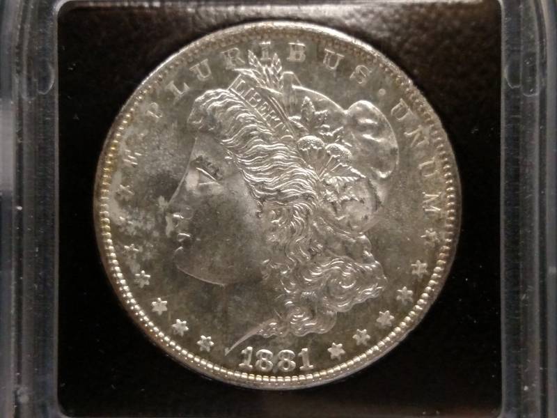 lot 9 image: 1881 S ICQ MS64 Morgan Silver Dolla...