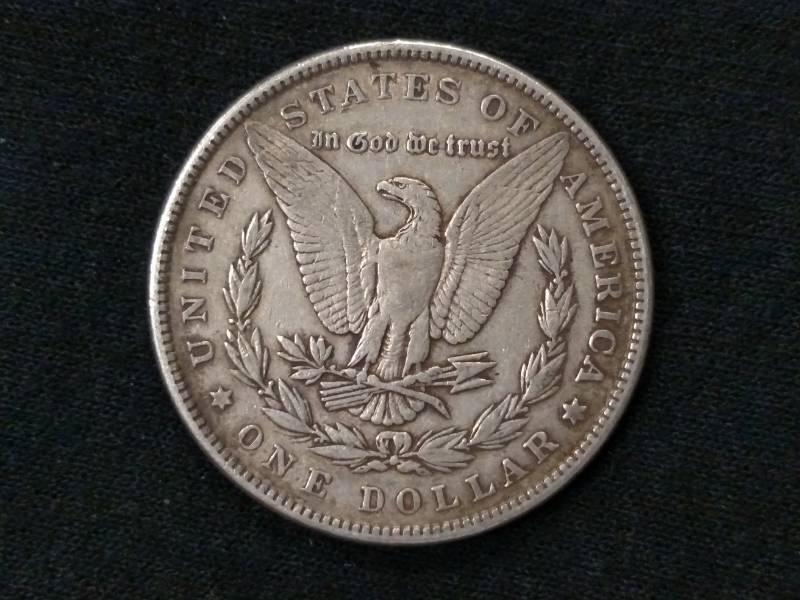lot 12 image: 1884 Morgan Silver Dollar...
