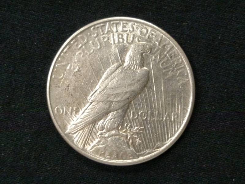 lot 32 image: 1935 Peace Silver Dollar ...