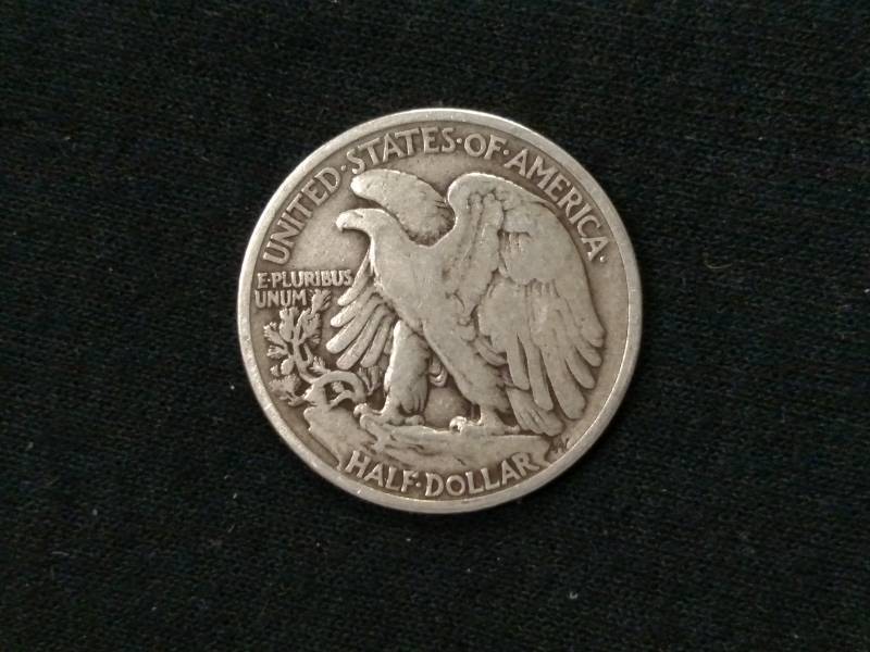 lot 35 image: 1934 Walking Liberty Silver Half Do...