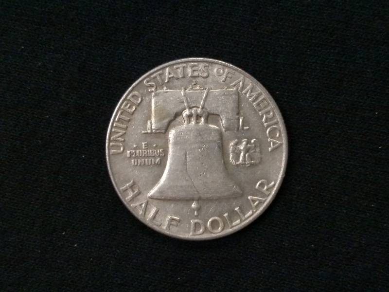 lot 61 image: 1957 D Franklin Silver Half Dollar...