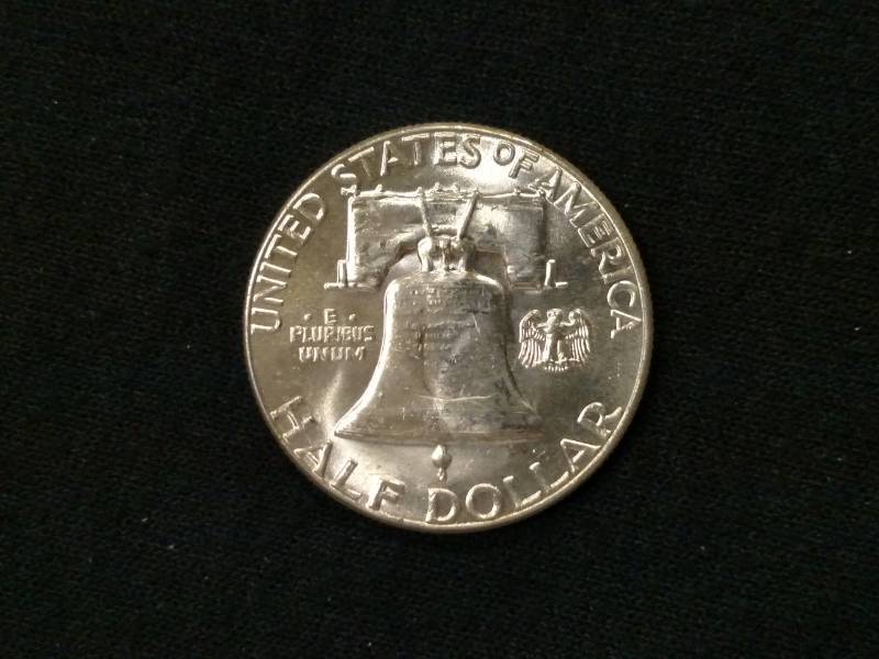 lot 62 image: 1958 AU Franklin Silver Half Dollar...