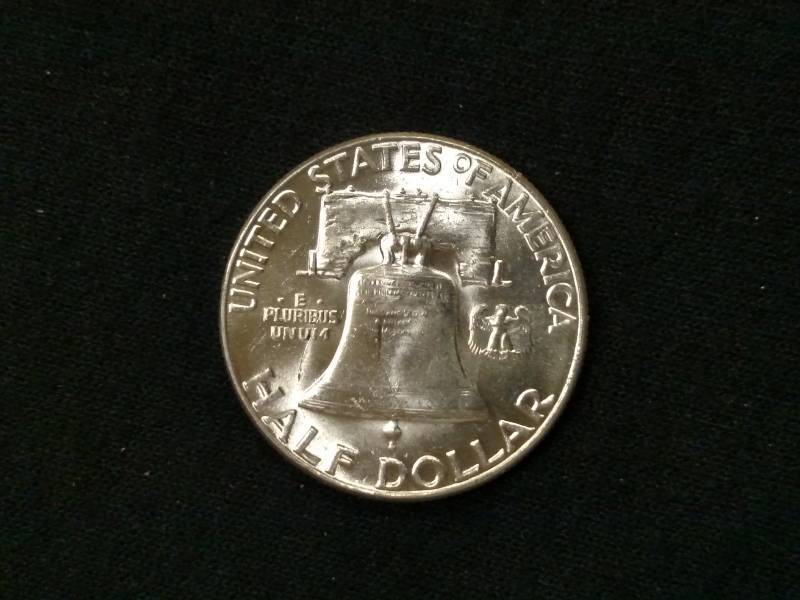 lot 65 image: 1960 AU Franklin Silver Half Dollar...