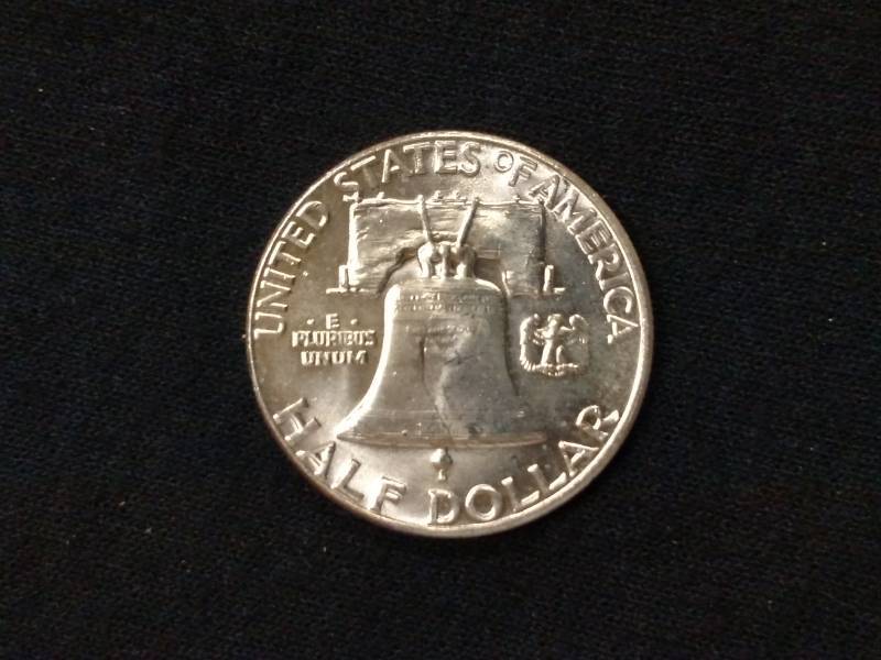 lot 68 image: 1962 AU Franklin Silver Half Dollar...