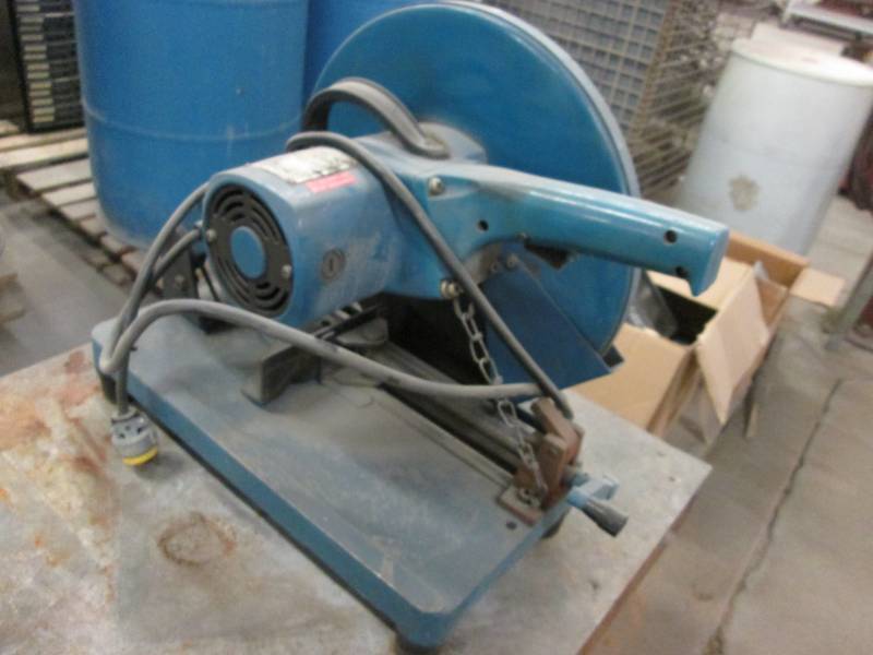 lot 1 image: Ryobi 14 cutting saw...