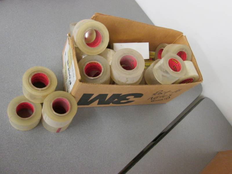 lot 35 image: Box of tape rolls and post it notes...