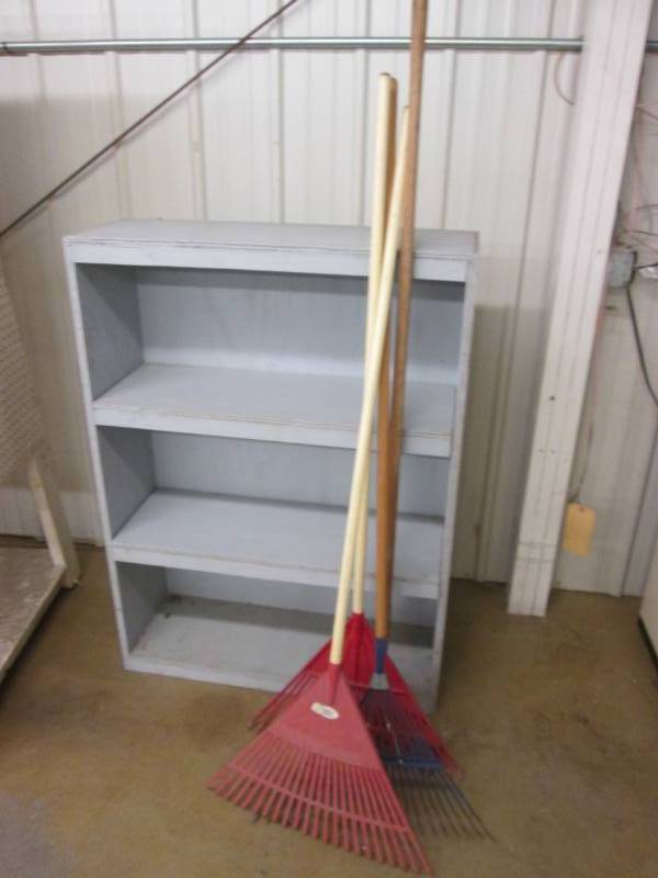 lot 58 image: Wood shelf and yard tools...