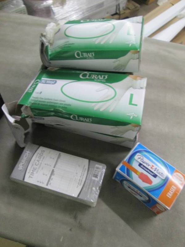 5 Boxes Large Vinyl Gloves- damaged...