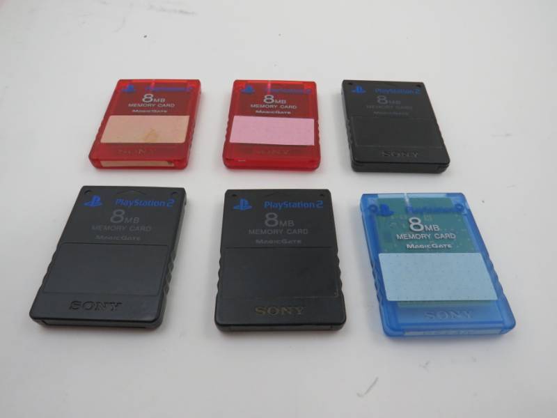 6 Play Station memory cards, Wii gaming system, Walkie Talkie, Tablet for a printer, and other things