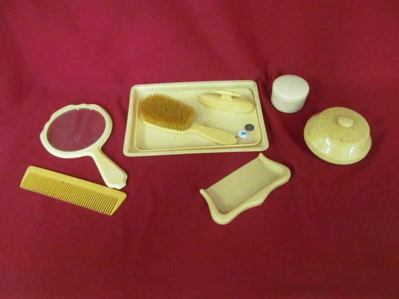lot 12 image: Celluloid dresser items