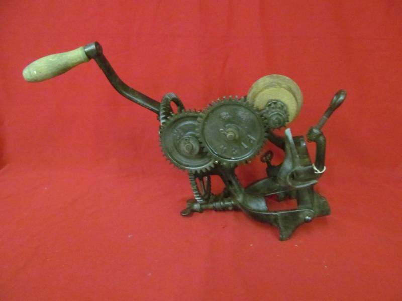 lot 136 image: Vintage McCormick Deere sickle blade sharpener
