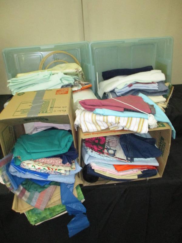 2 storage bins, 2 boxes of various quilts