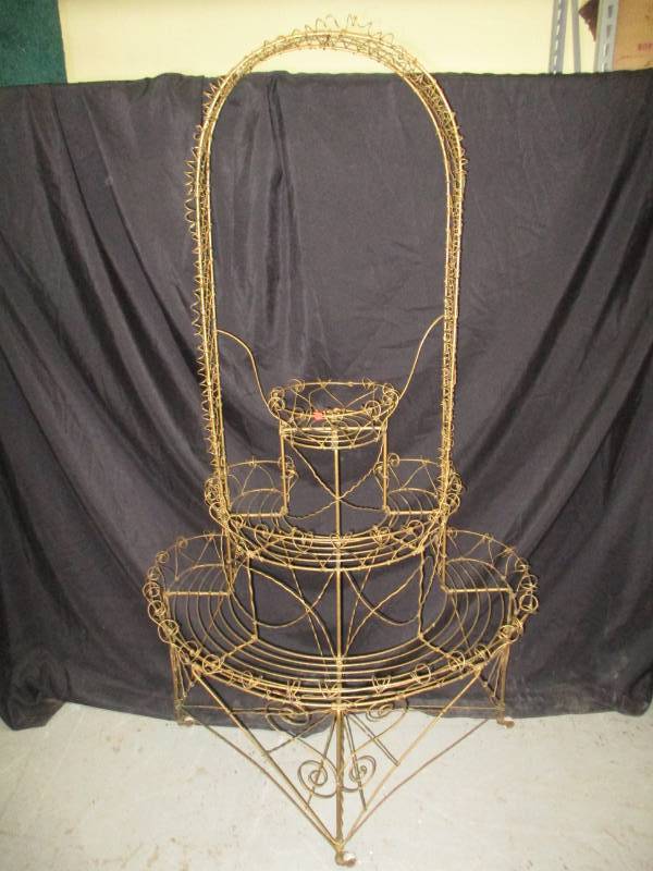 Metal Plant Stand Arch with rolling wheels Beautidul never seen anything like it before