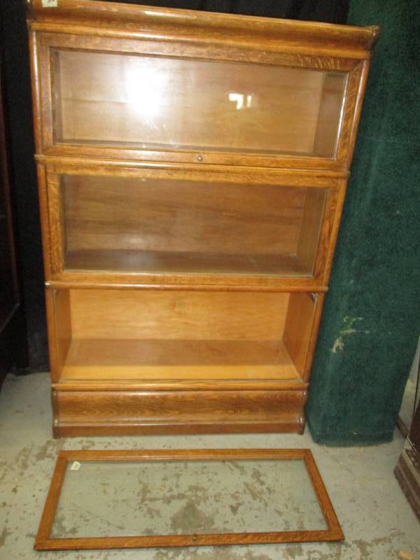 3 Door Lawyers book case lase door on bottom needs hinges