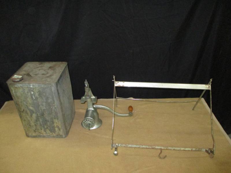 Metal can, grinder and door clothes rack