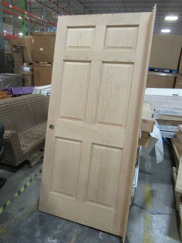 lot 14 image: ReliaBilt Unfinished 6-Panel Solid Wood Oak Single Slab (Common 36-in X 80-in) - Scratch and Dent.