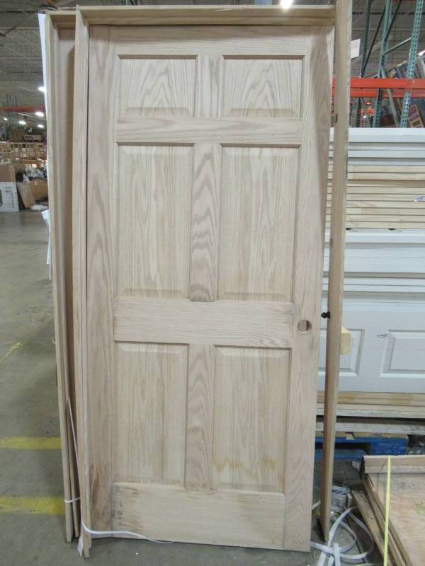 lot 15 image: ReliaBilt BrownUnfinished 6-Panel Wood Oak Single Prehung Door (Common 36-in X 80-in Actual 37.375-in x 82.1875-in) 687706