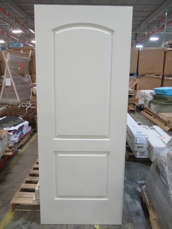 lot 54 image: ReliaBilt Continental Primed 2-Panel Round Top Hollow Core Molded Composite Slab Door (Common 32-in X 80-in) 244592