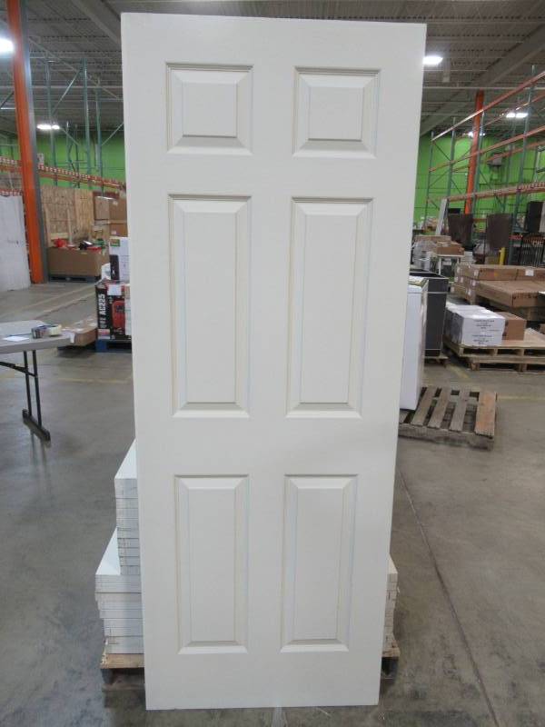 lot 38 image: ReliaBilt Colonist Primed 6-Panel Hollow Core Molded Composite Slab Door (30-in x 80-in) 10975