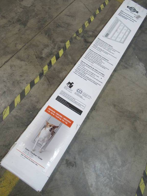lot 133 image: PetSafe 10-14 in. x 16-38 in. Large White Freedom Patio Panel (76 in. to 81 in.) Pet Door PPA11-13129