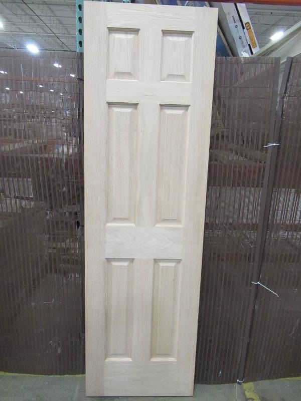 lot 179 image: Reliabilt 24 in. x 80 in. Unfinished No Bore 6-Panel Solid Core Oak Interior Door Slab 98674