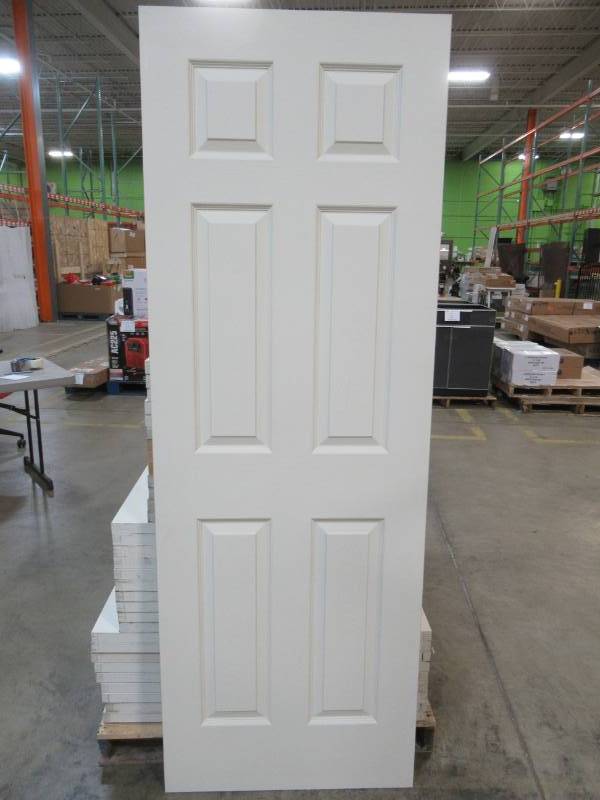 lot 30 image: Reliabilt 28 in x 80 in 6 Panel Primed No Bore Slab door 10974