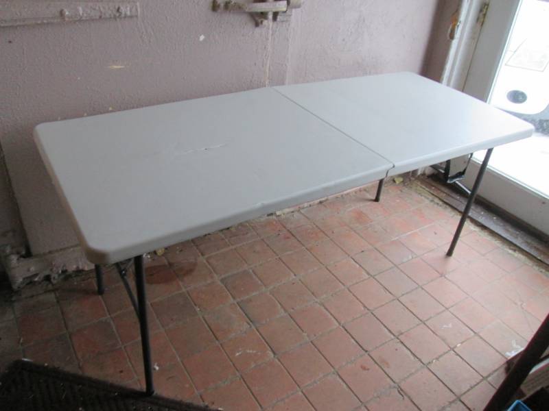 6 ft Folding Table Some top damage....