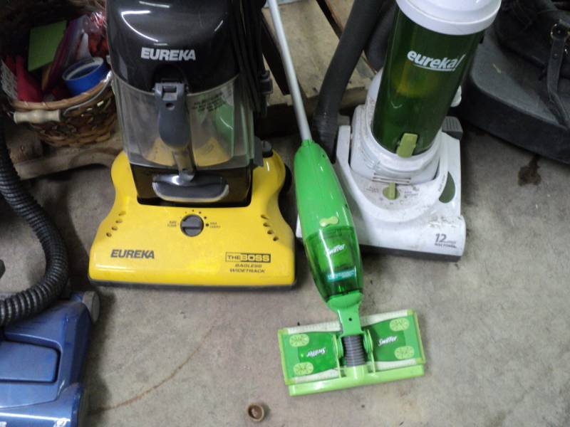 2 Eureka Vacuum Cleaners and a Swif...