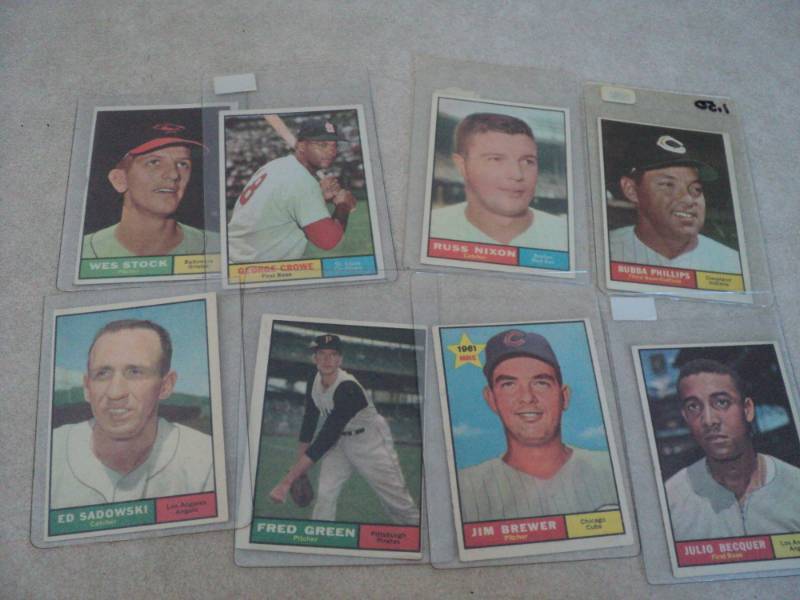 8 1961 Topps Baseball Cards...