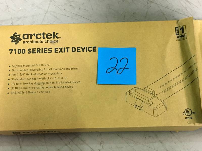 lot 22 image: Arctek Silver Rim Type Push Bar Exit Device Safety Rate in like new condition