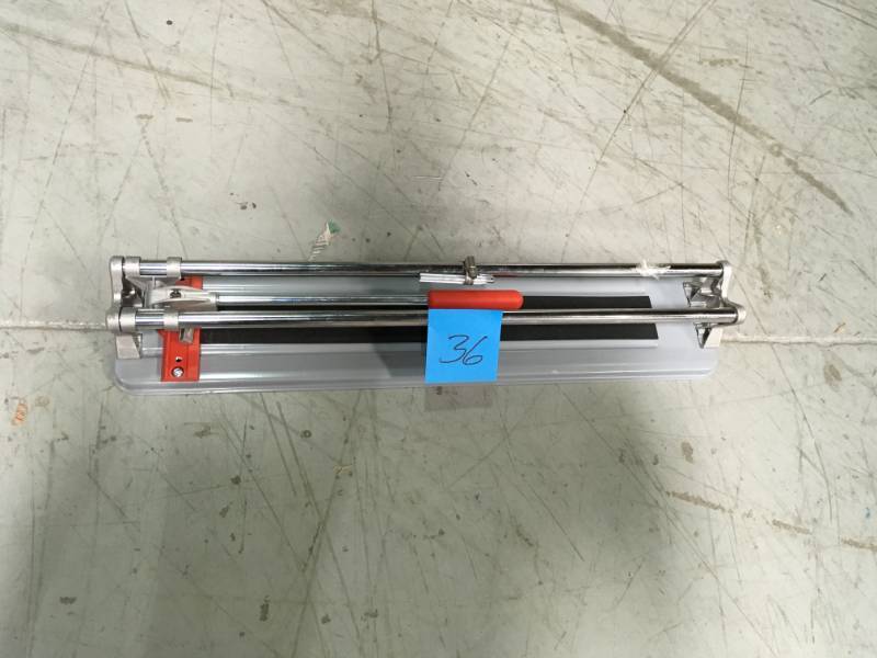 lot 36 image: Rubi 21 in. Practic Tile Cutter OPEN BOX