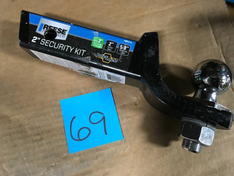 lot 69 image: Reese Towpower Class III 2 in. Drop Security Kit open box in like new condition