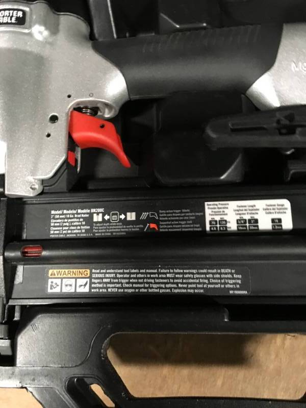 lot 70 image: Porter-Cable 18-Gauge Pneumatic Brad Nailer Kit open box in like new condition