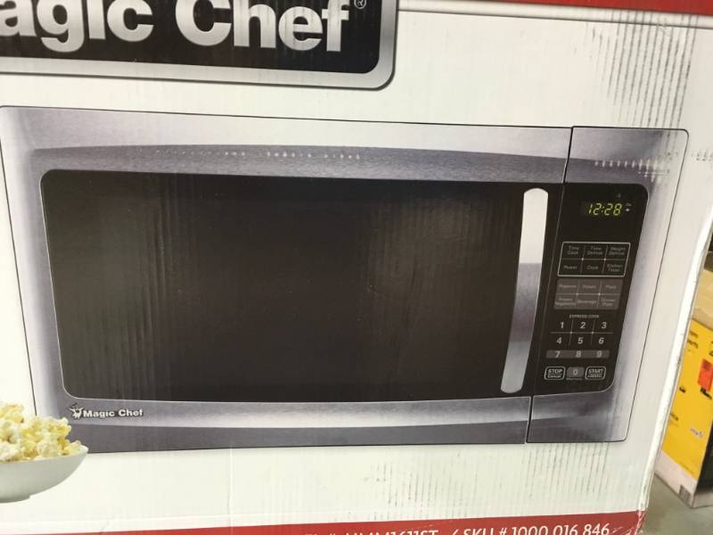 lot 20 image: Magic Chef 1.6 cu. ft. Countertop Microwave in Stainless Steel open box in like new condition