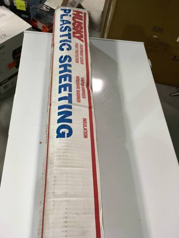 lot 21 image: HUSKY 12 ft. x 50 ft. Clear 6 mil Plastic Sheeting open box in like new condition