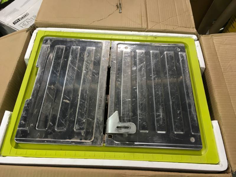 lot 22 image: Ryobi 7 in. 4.8 Amp Tabletop Tile Saw in good condition