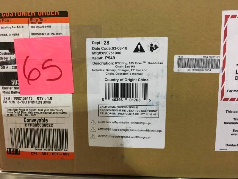 lot 65 image: Ryobi ONE 12 in. 18-Volt Brushless Lithium-Ion Electric Cordless Chainsaw - 4.0 Ah Battery and Charger Included open box in like new condition