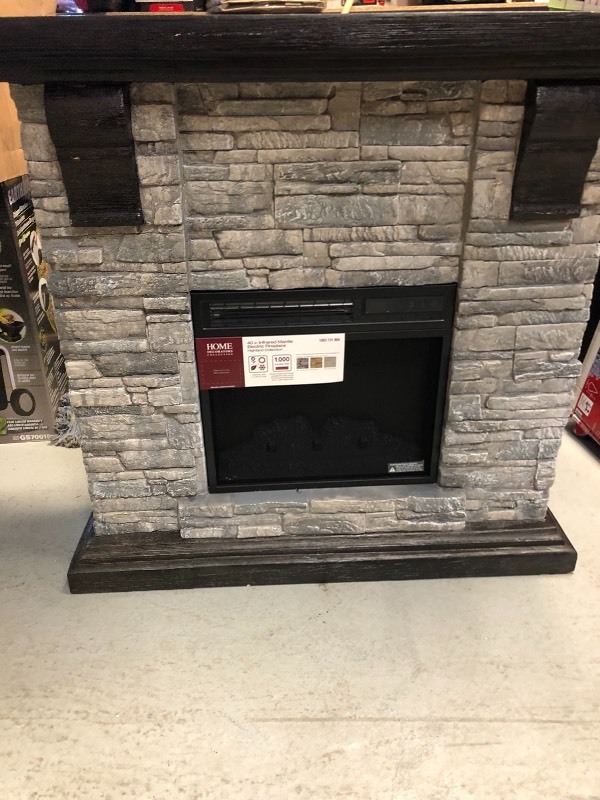 lot 103 image: Home Decorators Collection  Highland 40 in. Media Console Electric Fireplace TV Stand in Faux Stone Gray in good conditions whits some smalls scratches