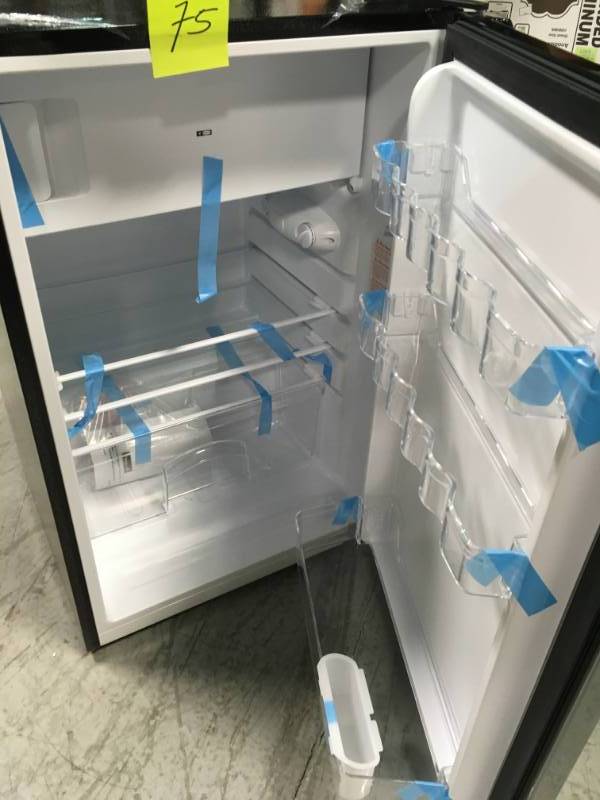 Magic Chef 4.5 cu. ft. Mini Refrigerator with True Freezer in Stainless Look Please see photos for small dent