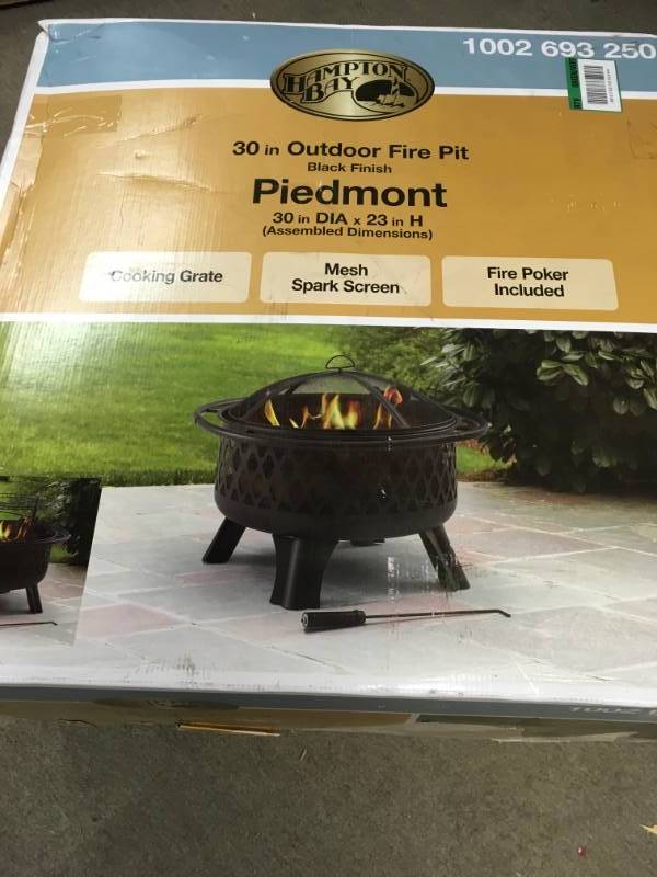 lot 21 image: Hampton Bay Piedmont 30 in. Steel Fire Pit in Black with Poker not used