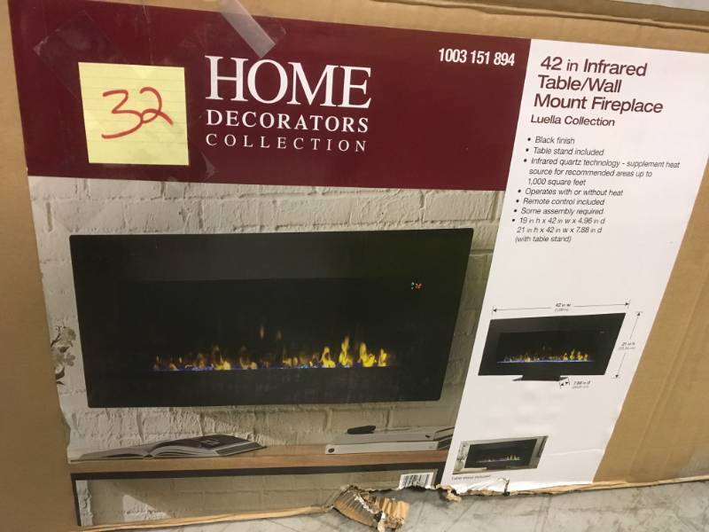 lot 32 image: Home Decorators Collection 42 in. Infrared Wall Mount Electric Fireplace not used