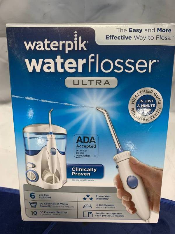 lot 25 image: Waterpik Ultra Water Flosser
