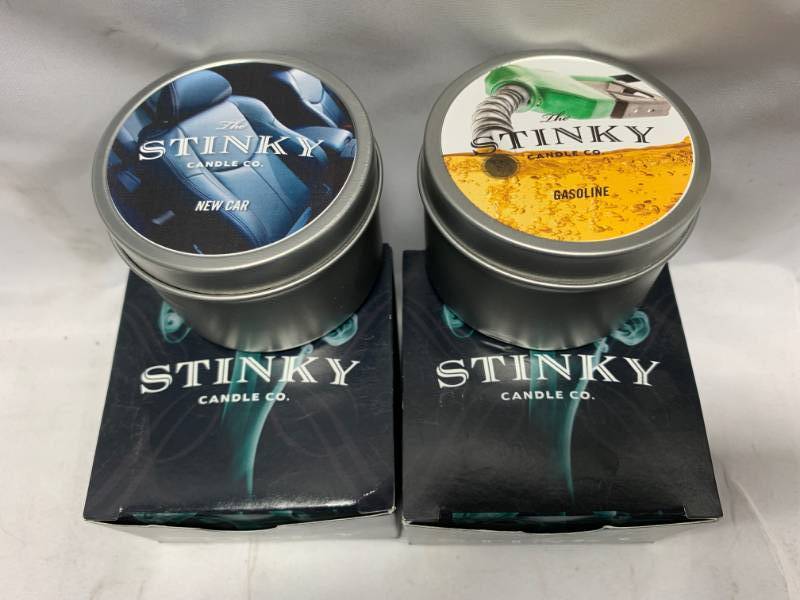lot 58 image: Lot of 2 Stinky Candles (new car smell & gasoline)