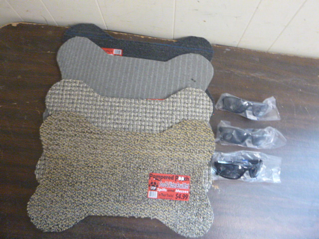 lot 99 image: Pet Food Mats and Sunglasses
