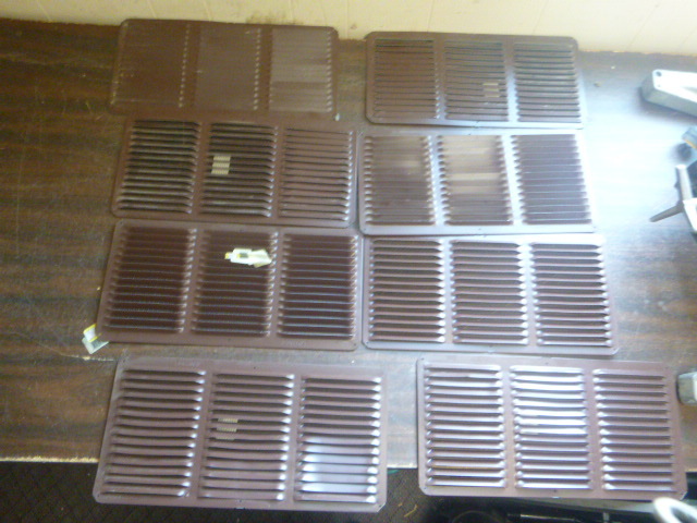 lot 111 image: 8 Furnace Grate Covers